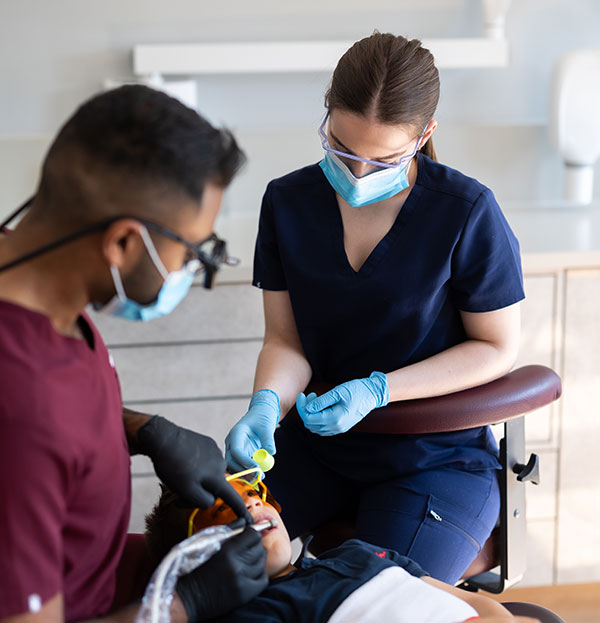 Dr-Aynkkaran-and-Nurse-Isabella-with-child-patient