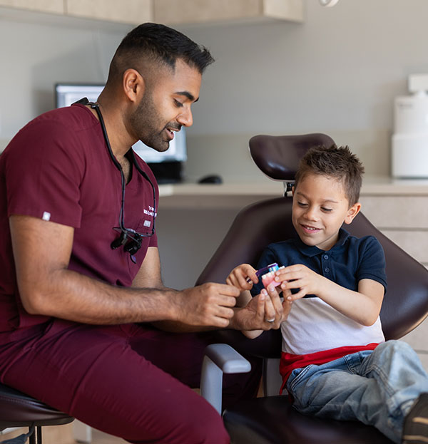 Dr-Aynkkaran-with-Happy-Child-Patient